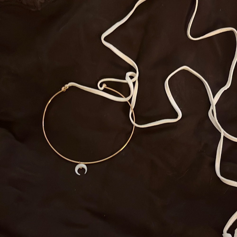 Interesting choker necklace with leather straps